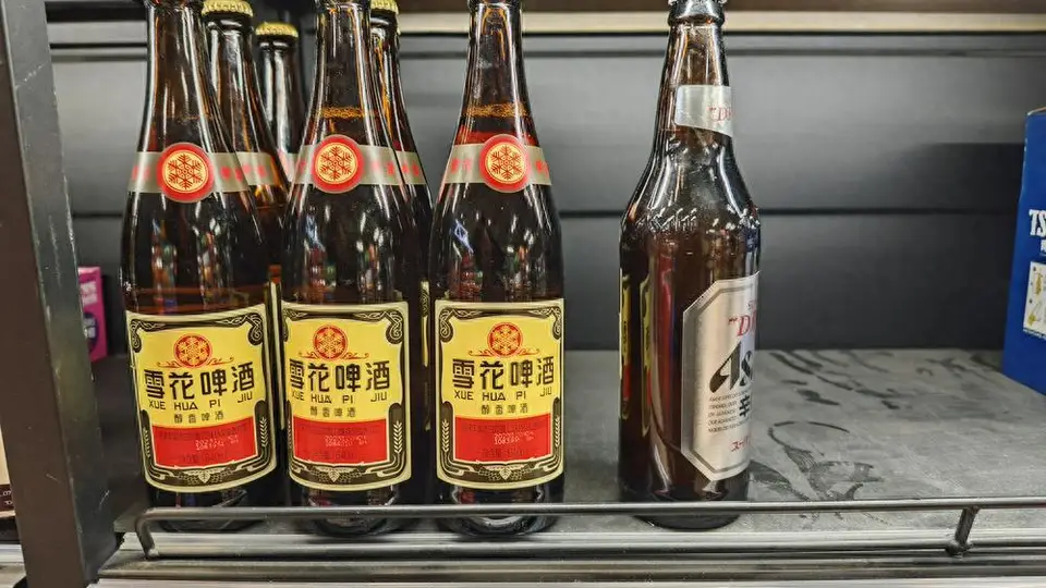 白酒业务“拖累”、半年净利下滑 华润啤酒商誉减值风险犹存？ | 财报解读