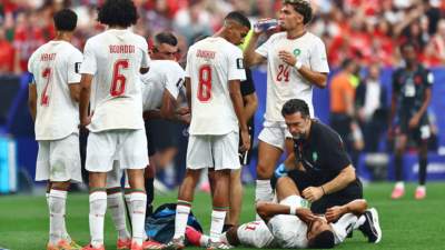 世界杯-塞巴里伤退半场6人染黄 加拿大半场0-0摩洛哥