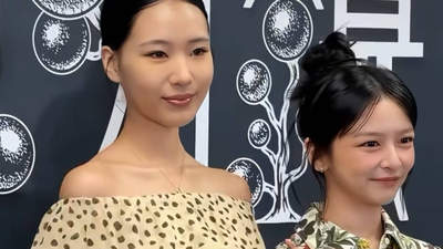 小S长女Elly现身公开活动 美黑搭波点裙成焦点 笑时捂嘴获同行温柔提醒